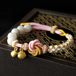 The Peace & Prosperity Bracelet, crafted with intricate flower knot detailing, is a stunning artisan piece designed to draw in good fortune, making it a meaningful Feng Shui gift, a thoughtful birthday present for her, or a unique souvenir to cherish