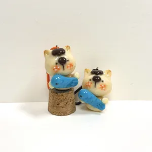 The Handmade Clay Cat Hugging Fish Keychain boasts a charming look that everyone adores, making it a lovely accessory - a handcrafted bag charm and clay keychain that's the perfect cute gift for her