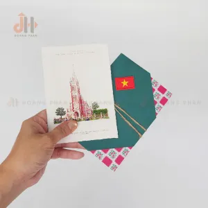 The Tan Dinh Church Handmade Postcard from the I Love Saigon Collection beautifully captures this unique spiritual destination, featuring a hand-drawn postcard paired with a handmade envelope, making it a perfect souvenir of Saigon