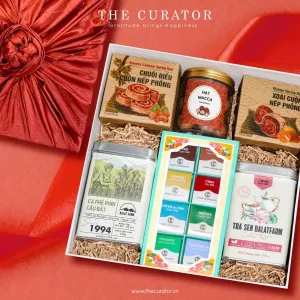 The "Viet Authentic Taste" Gift Set captures a corner of Vietnamese flavor, featuring a premium selection of tea, coffee, nuts, and dried fruits—an exquisite Vietnamese specialty gift set perfect as a corporate gift box