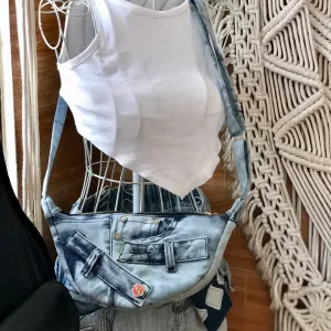 Striped blue tie-dye crossbody bag from recycled jeans – unique fabric mix creates strong impression, eco-friendly half-moon bag, sustainable fashion accessory and creative birthday gift.