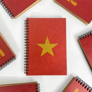Celebrate national pride with the Vietnamese National Flag Notebook, a bold Red Flag with Yellow Star Spiral Notebook that evokes the spirit of Reunification Day - a meaningful Vietnamese souvenir for collectors and patriots alike.