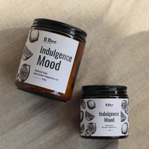The "Indulgence Mood" Scented Candle with Sticker, made from premium ingredients, immerses you in sweetness and allure, making it an exquisite birthday gift that offers a natural, soothing fragrance.