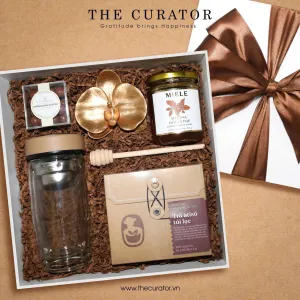 Enjoy Simplicity gift box evokes emotion through natural charm, featuring premium tea set with fine chocolate and pure honey, presented in warm brown tones as meaningful birthday or elegant corporate luxury gift.