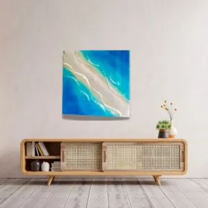 Smooth epoxy resin art measuring 30 x 30cm captures gentle ocean beauty through 3D epoxy resin seascape techniques, creating handcrafted wall art perfect as meaningful housewarming gift.