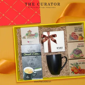 The "Viet Heritage" gift box captures the essence of Vietnam with coffee, elegant cups, and dried fruits – a premium specialty gift for corporate occasions.