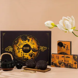 “Brown Moonlight” gift box with 4 chocolate mooncakes, assorted chocolates, nuts & cutlery set – premium Mid-Autumn corporate gift.