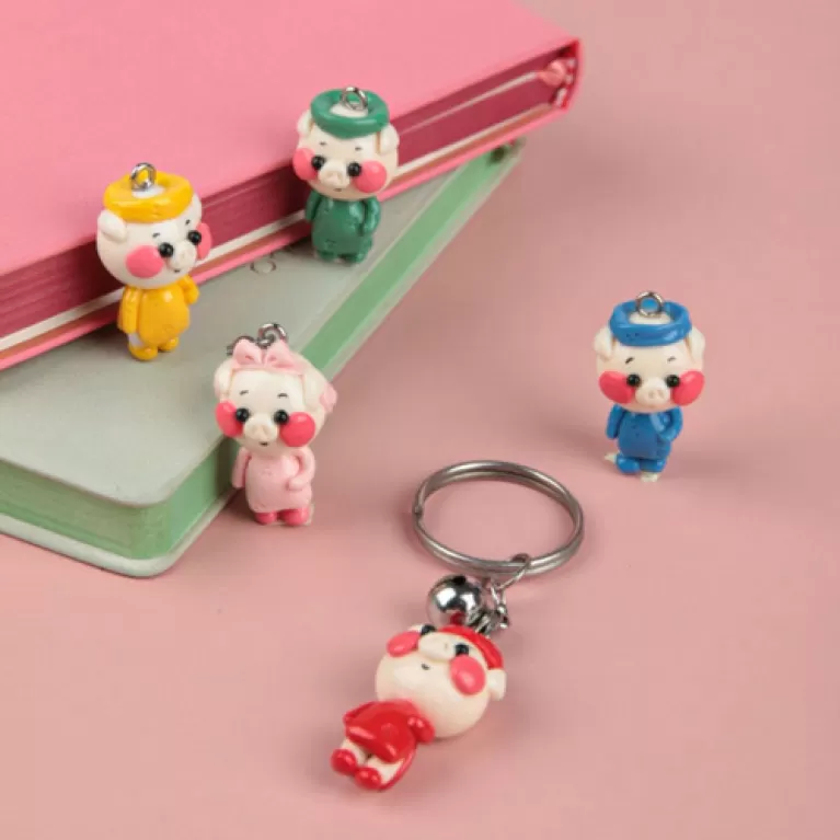 little pig in ao dai key rings, adorable pig-shaped keychain, made of clay, easy to clean, perfect gift for family and friends