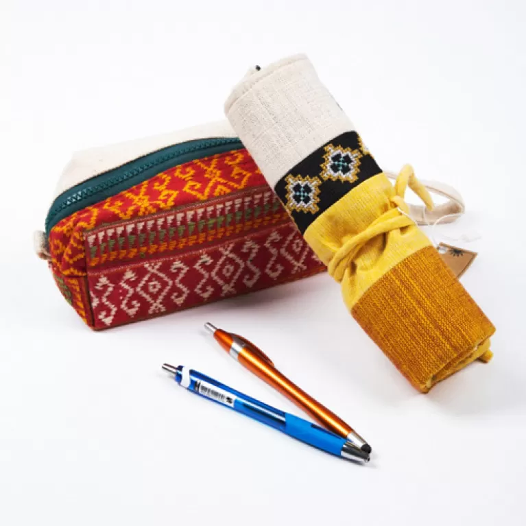 brocade pen bag, traditional terracotta pattern, unique cylinder design, durable material, handcrafted product, unique accessory