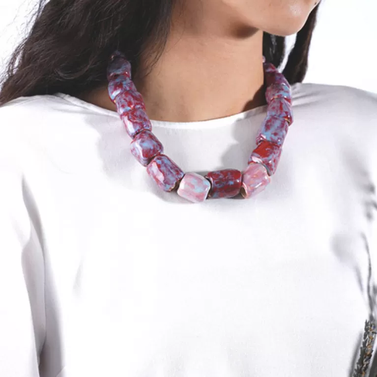 red bamboo joint necklace, bold and powerful color, glazed ceramic material, unique design, exudes authority