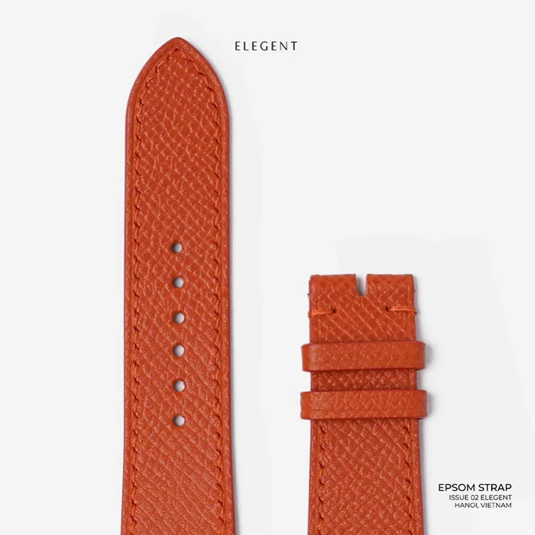 orange epsom leather handcrafted watch strap, delicate grain pattern, durable strap, resistant to creasing over time, trendy orange tone
