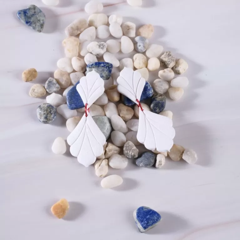 sabrina clay earrings, fan-shaped design with vein patterns, feminine and delicate style, pairs well with various outfits