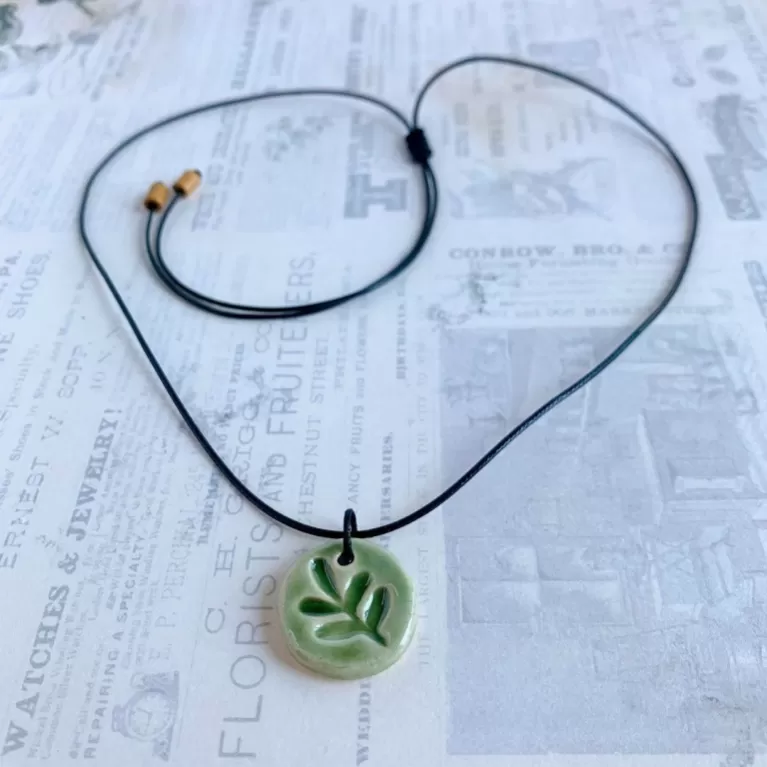 small leaf ceramic necklace, shiny glazed ceramic material, fresh and cool green color, simple and natural style, gift for nature lovers