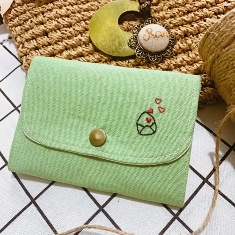 hand-embroidered linen fabric wallet, adorable hand-embroidered pattern, 3 convenient compartments, lovely handmade accessory