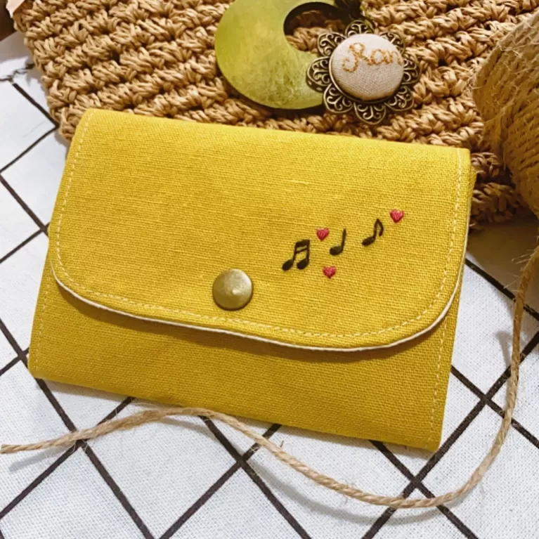 hand-embroidered linen fabric wallet, adorable hand-embroidered pattern, 3 convenient compartments, lovely handmade accessory