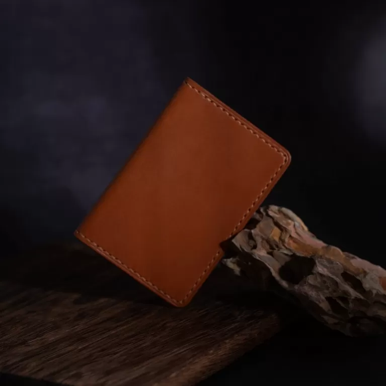 double-compartment vachetta leather card holder, minimalist style, premium italian leather, develops a beautiful patina over time