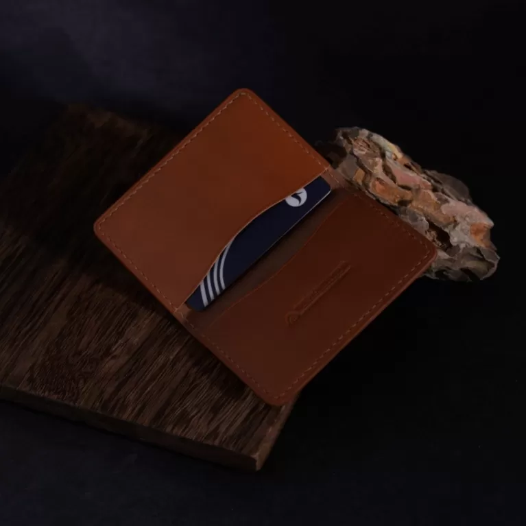 double-compartment vachetta leather card holder, minimalist style, premium italian leather, develops a beautiful patina over time