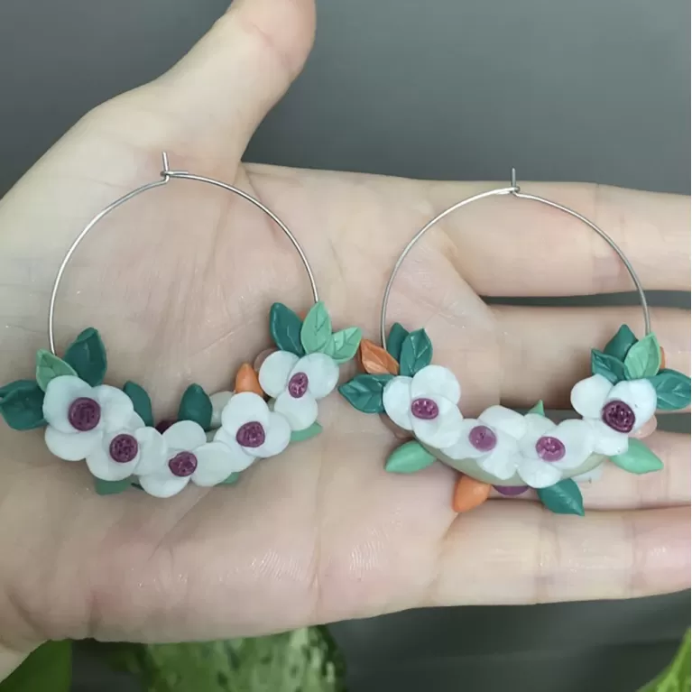 flower round clay earrings, meticulous attention to detail, elegant design, perfect choice for accessories enthusiasts