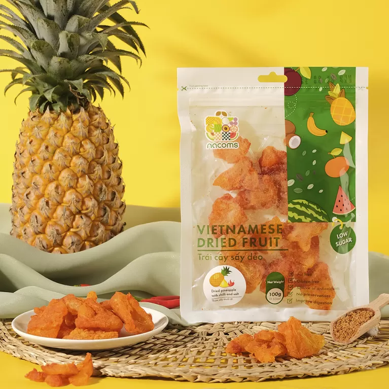 dried pineapple with chilli and salt, sweet and sour dried fruit, vitamin-rich snack, soft dried pineapple, snack with friends
