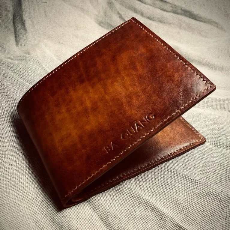 engraved fold leather wallet, veg leather, multiple small compartments, minimalist and sophisticated design, custom engraving available