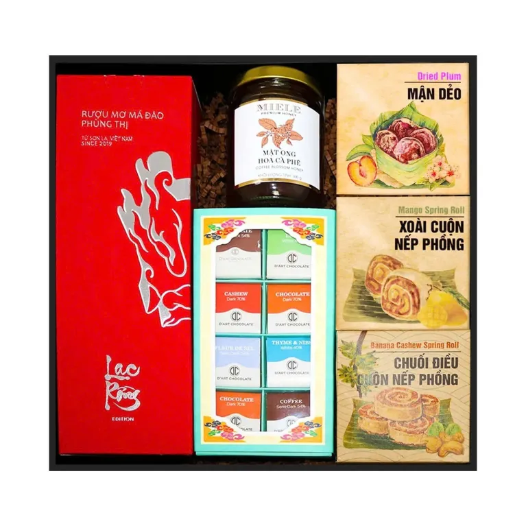 "The Festive Season" Gift Box, features a curated selection of Vietnamese Delicacies, including Phung Thi Apricot Craft Liqueur, Coffee Blossom Honey, and Chocolate and Fruit.