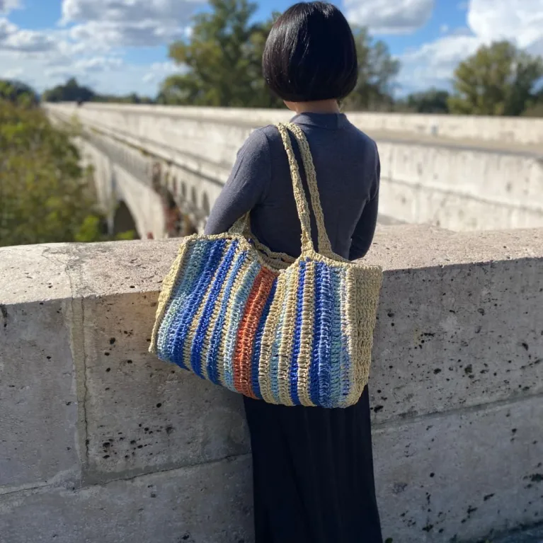 The Raffia Versa Longb_Col01 Tote Bag is the perfect choice for your active day, serving as a stylish daily handbag and a standout sustainable fashion accessory, making it a unique and thoughtful birthday gift.