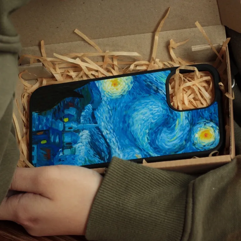 The "Starry Night" Hand-Drawn Leather Phone Case, inspired by Van Gogh's iconic painting with signature or name engraving, making it the perfect art phone case and a thoughtful personalized gift.