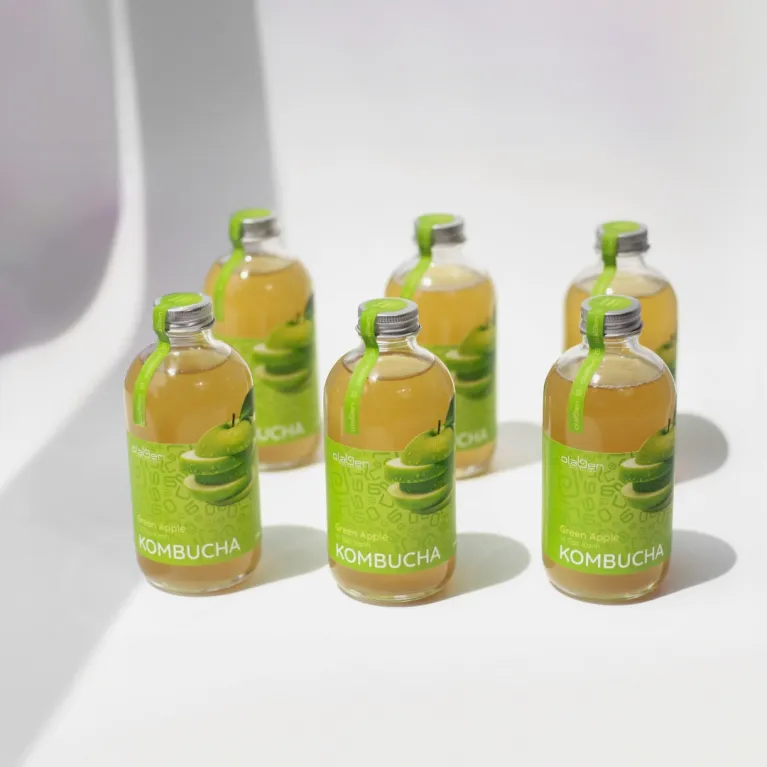 Enjoy the refreshingly tart flavor of Green Apple Kombucha, a naturally fermented tea made with natural ingredients, perfect for supporting your digestive system and a great health gift for loved ones.