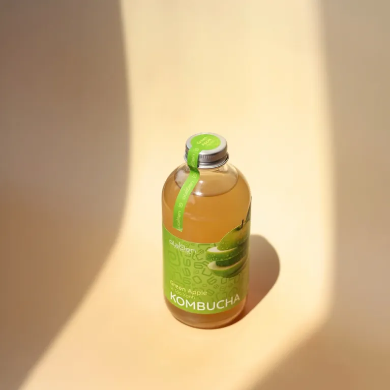 Enjoy the refreshingly tart flavor of Green Apple Kombucha, a naturally fermented tea made with natural ingredients, perfect for supporting your digestive system and a great health gift for loved ones.