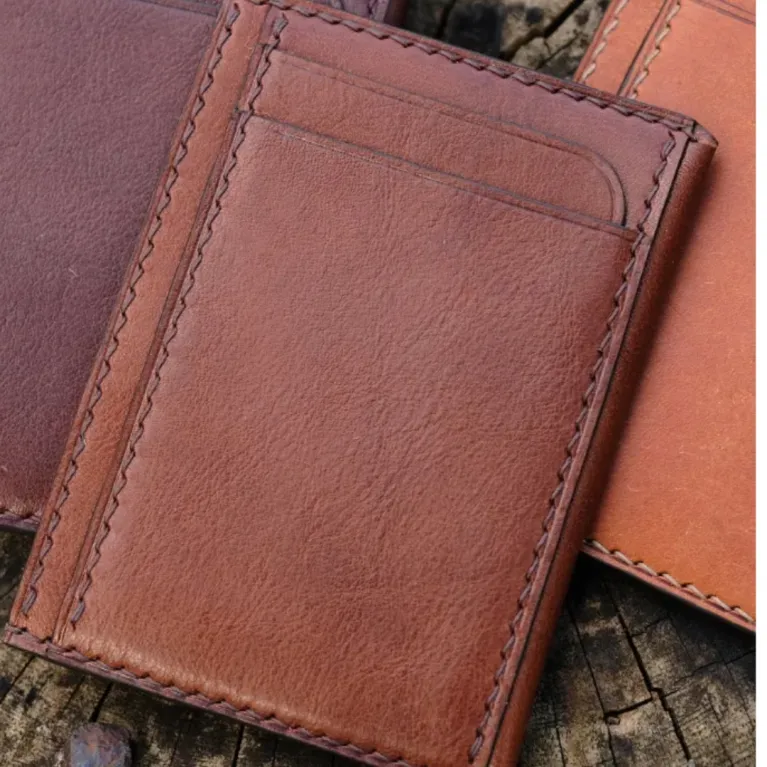 The Personalized Leather Card Holder is a luxury men's wallet with 4 compartments, crafted by hand as a perfect gift for him and a standout piece of artisan accessories.
