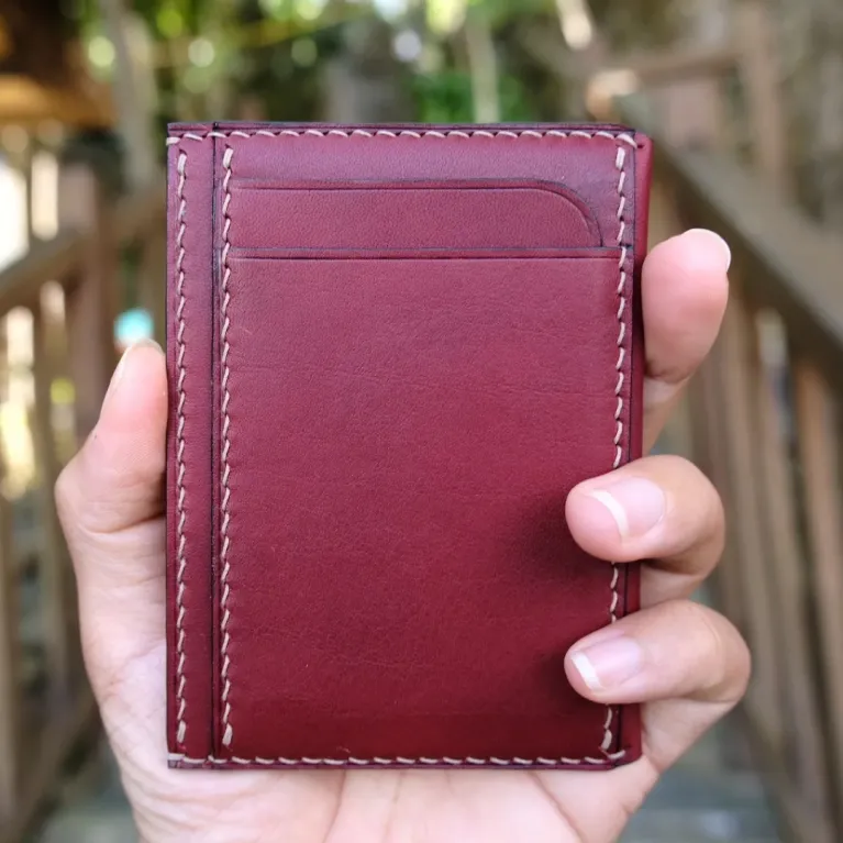 The Personalized Leather Card Holder is a luxury men's wallet with 4 compartments, crafted by hand as a perfect gift for him and a standout piece of artisan accessories.