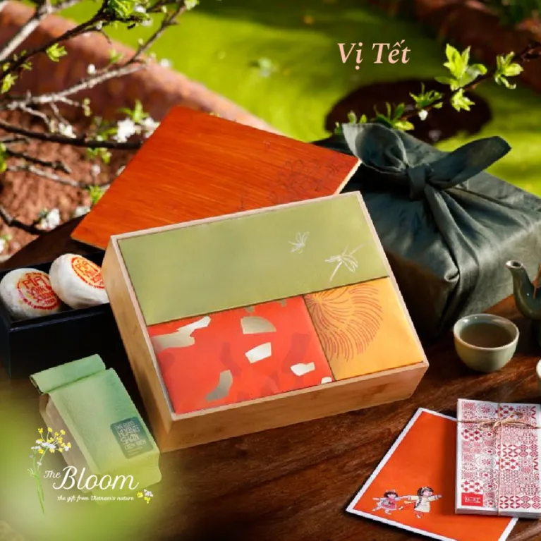 The "Taste of Tet" Gift Box is the perfect authentic Vietnamese Tet gift package, featuring Tet specialties like premium tea, fine wine, and delicacies, all beautifully presented in a handcrafted bamboo gift box, making it an ideal corporate gift to celebrate the Lunar New Year