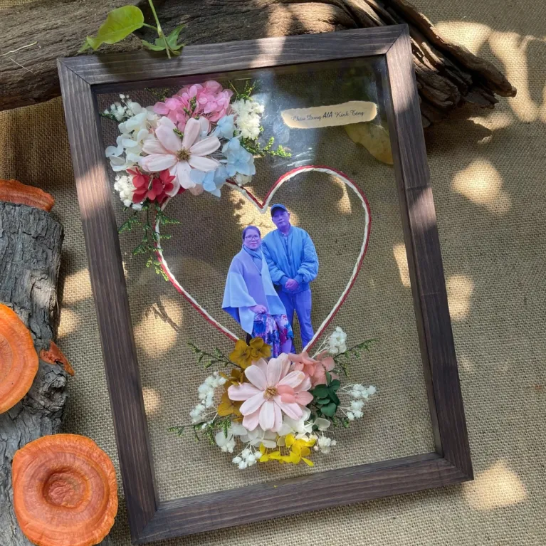 Personalized Dried Flower Photo Frames offer a unique way to cherish memories, allowing you to customize the photo, colors, and quotes in a beautifully crafted dried flower frame, making it the perfect personalized gift