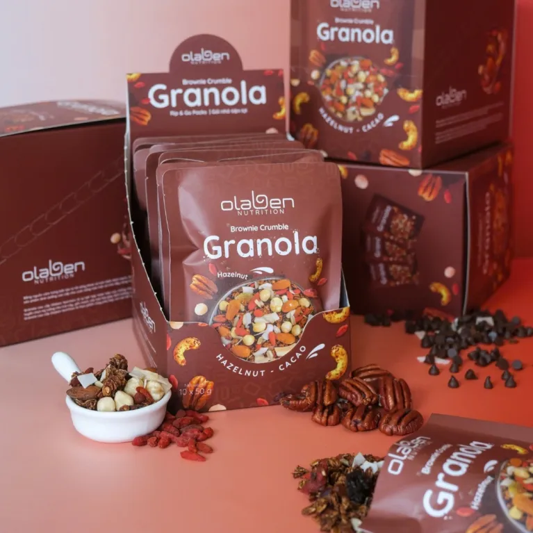Savor the indulgent Brownie Crumble Granola—a pack of 10 cocoa-infused delights featuring nutritious grains, perfect as a diet-friendly, healthy snack or convenient meal option with its irresistible flavor and wholesome goodness
