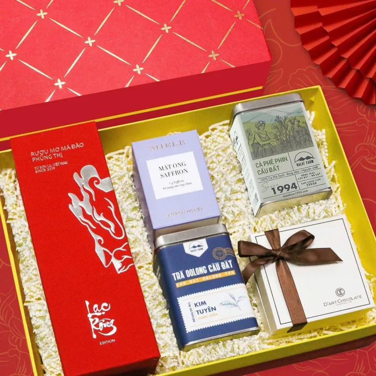 The "Lạc Hồng" Tet Gift Set, embracing the essence of Vietnamese Tet, features a premium collection of wine, coffee, tea, honey, and chocolate, making it the perfect Tet gift box and an ideal choice for premium corporate Tet gifts