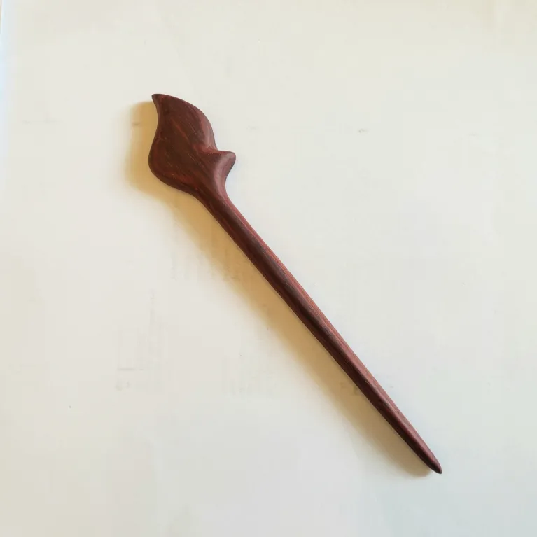 The Traditional Wooden Leaf Hair Stick is a timeless handmade hair accessory that beautifully embraces classic elegance, making it a perfect traditional accessory to elevate any hairstyle - an ideal gift for her or a heartfelt gift for mom