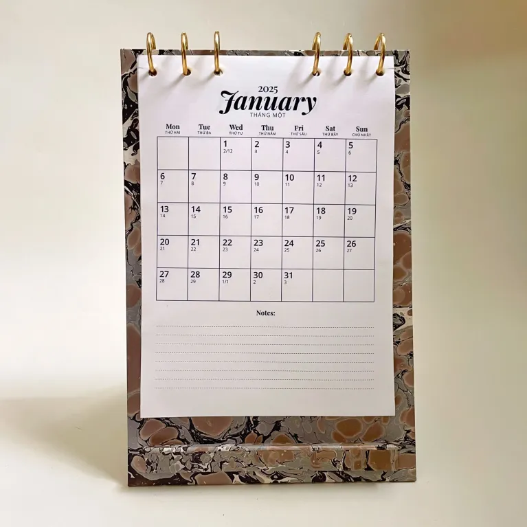 Start your year with the Marbled A5 Table Calendar, a daily dose of art and functionality, featuring a reusable 2025 calendar set that doubles as a unique art calendar and stylish stationery, making it the perfect New Year gift.