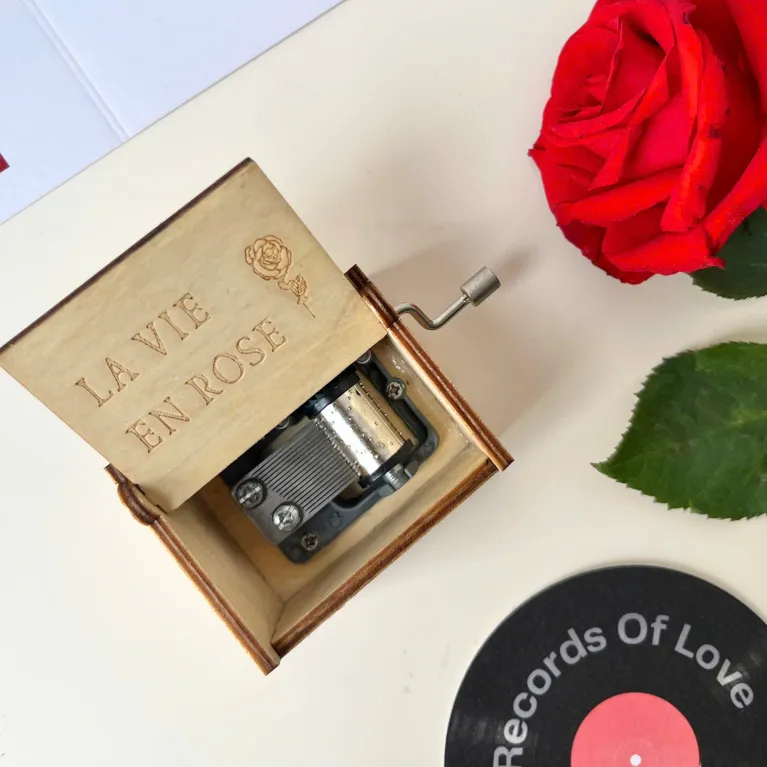 The "Actually" Valentine Gift Box creates a romantic love melody, featuring a charming music box, elegant glass, and decadent chocolate - the perfect Valentine's Day gift for her to cherish and celebrate love