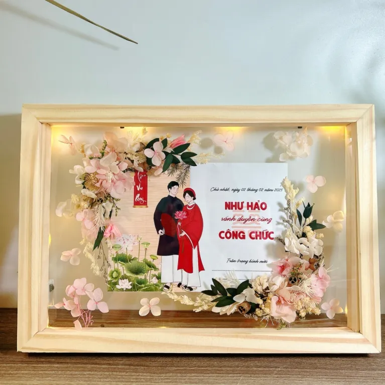 A Custom Photo with Dried Flower Frame beautifully combines handmade flower art and personalization, creating a unique way to preserve precious moments- a thoughtful gift for her that turns memories into timeless custom dried flower art.