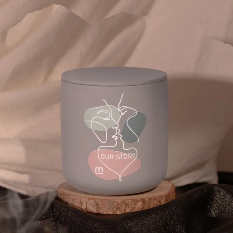 The Scented Candle in Leather Holder & Silk Scarf Gift Set is a thoughtful gift wrapped in love, featuring a scented candle with a hidden message in a personalized jar—a perfect gift for her on any special occasion.