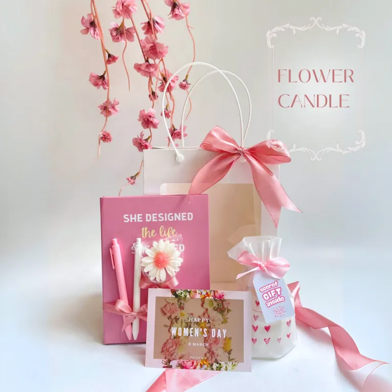 The "Flower Candle" Gift Set is a charming blind bag gift box with scented wax, a notebook, and a ballpoint pen, making it an adorable Women's Day gift for your girlfriend or any cute gift to cherish special moments