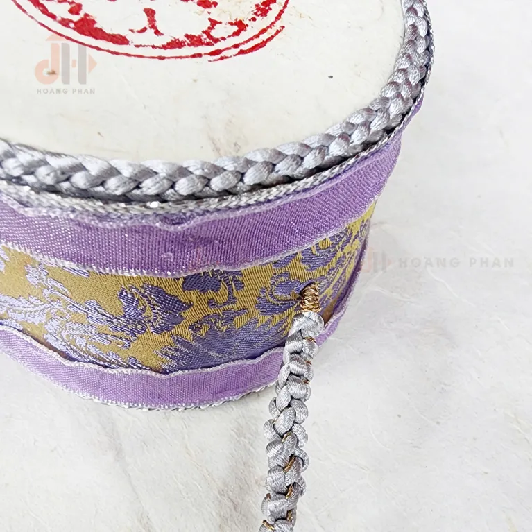 The Silver "Trường An" Vietnamese Tambourine Gift Box beautifully embodies strong cultural identity, featuring a handheld rattle drum that captures the essence of a cherished Vietnamese toy, making it a meaningful Vietnamese gift and a delightful gift for kidsThe Silver "Trường An" Vietnamese Tambourine Gift Box beautifully embodies strong cultural identity, featuring a handheld rattle drum that captures the essence of a cherished Vietnamese toy, making it a meaningful Vietnamese gift and a delightful gift for kids