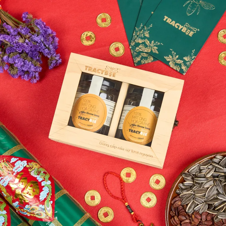 The Pure Coffee Blossom Honey Duo Gift Box blends sweetness & sophistication, featuring real honey from coffee orchards in a luxurious wooden gift box - a perfect health gift set for any occasion.