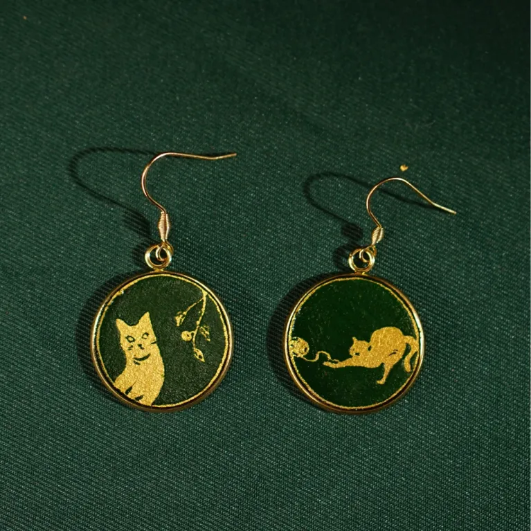 The "Cat & Box" Earrings with Hand-Drawn Leather feature distinctive strokes and artistic design, making them the perfect fashion accessory and a thoughtful birthday gift for her or a gift for your girlfriend.