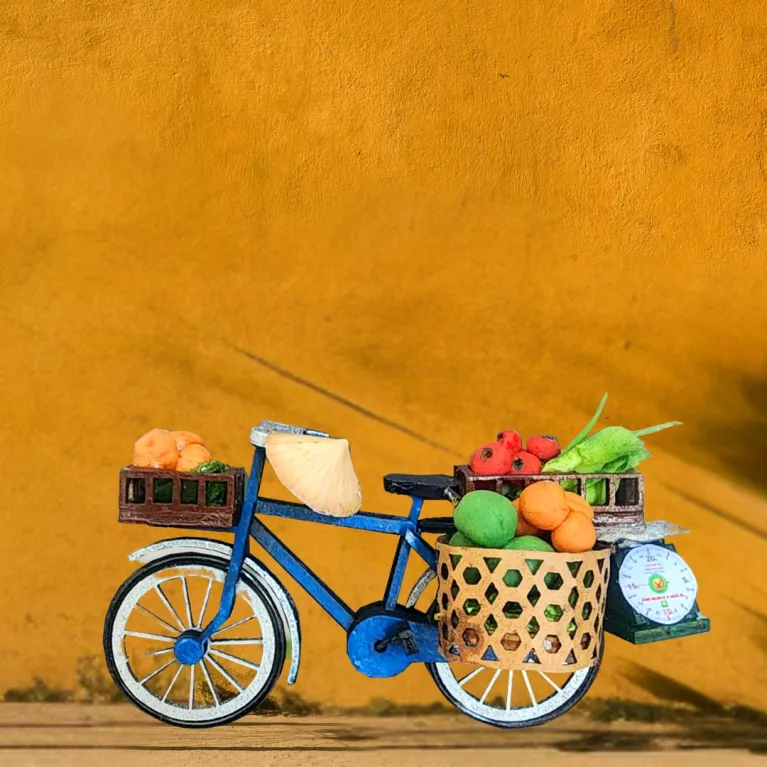 The Vietnamese Bike Vendor Magnet from the Little Vietnam Collection is a creative refrigerator magnet - an exquisite handmade gift and an impressive Vietnamese souvenir for any travel enthusiast.