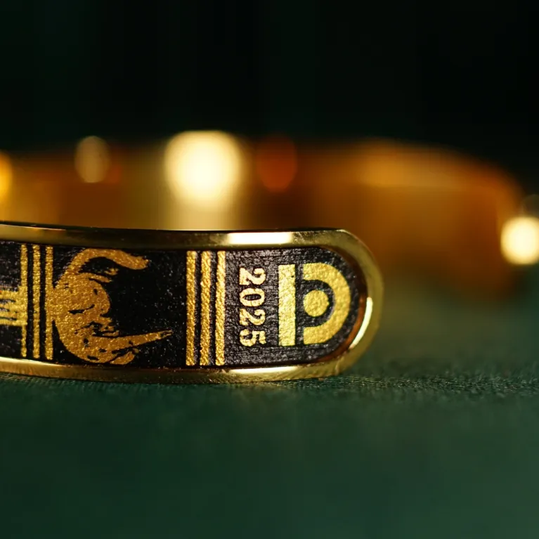 The "Cat & Box" Metal Cuff Bracelet With Hand-Painted Leather is a handmade fashion accessory that beautifully highlights individuality, making it a perfect birthday gift for her.