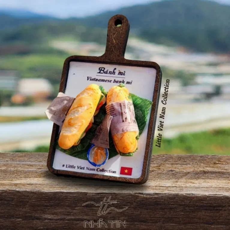 The Vietnamese Food Tray Fridge Magnet from the Little Vietnam Collection is a charming decorative souvenir, perfect as a Vietnamese specialty refrigerator magnet and a unique keepsake