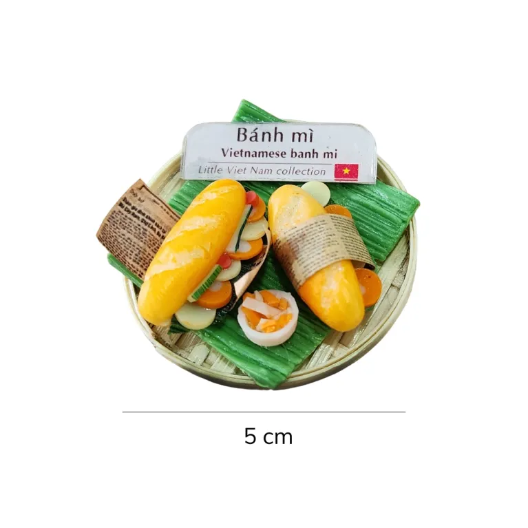 The Vietnamese Food Round Tray Magnet from the Little Vietnam Collection is a beautifully crafted Vietnamese-themed refrigerator magnet, making it a perfect handmade souvenir and a unique Vietnamese souvenir to cherish the flavors of Vietnam.