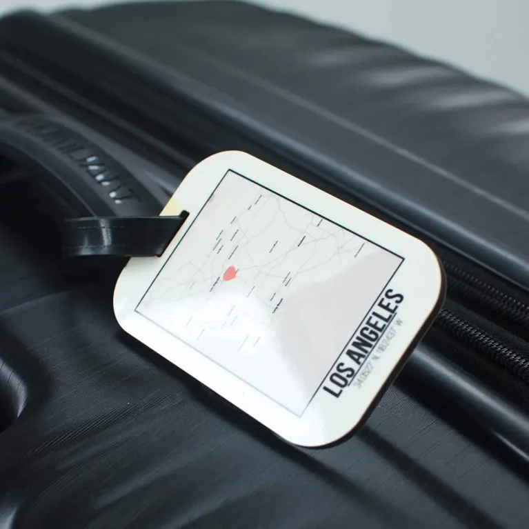 Vietnamese love city theme luggage tags capture journeys full of emotions through beautiful suitcase tags and elegant bag charms that double as handmade keychains, creating unique accessories perfect as meaningful Vietnam souvenirs.