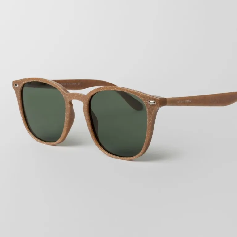 Brown frame sunglasses made from recycled plastic featuring an impressive elegant design, providing effective UV protection with premium quality, serving as both an eco-friendly recycled accessory and unique thoughtful birthday gift.